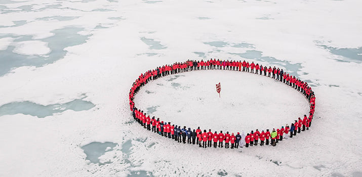 Circle ceremony in a North Pole expedition cruise
