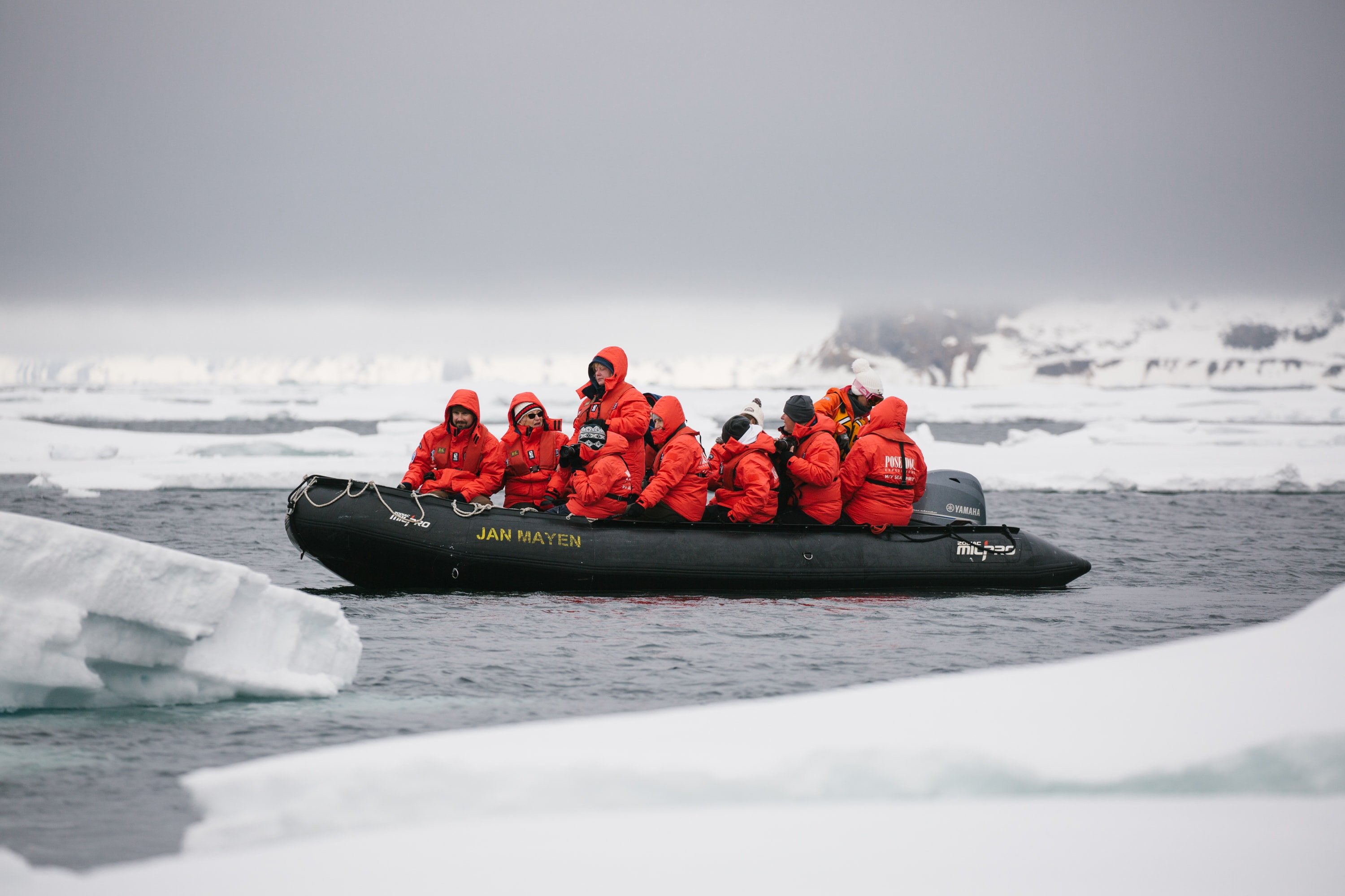 Zodiac cruising among ice of Spitsbergen