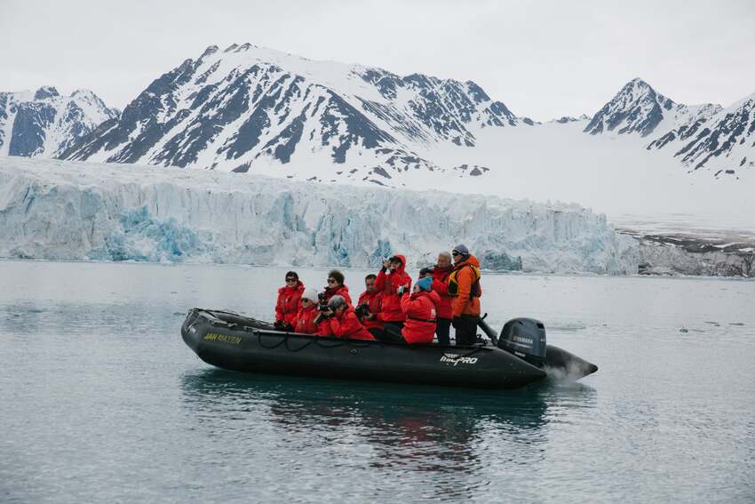 Zodiac boat cruising in Svalbard