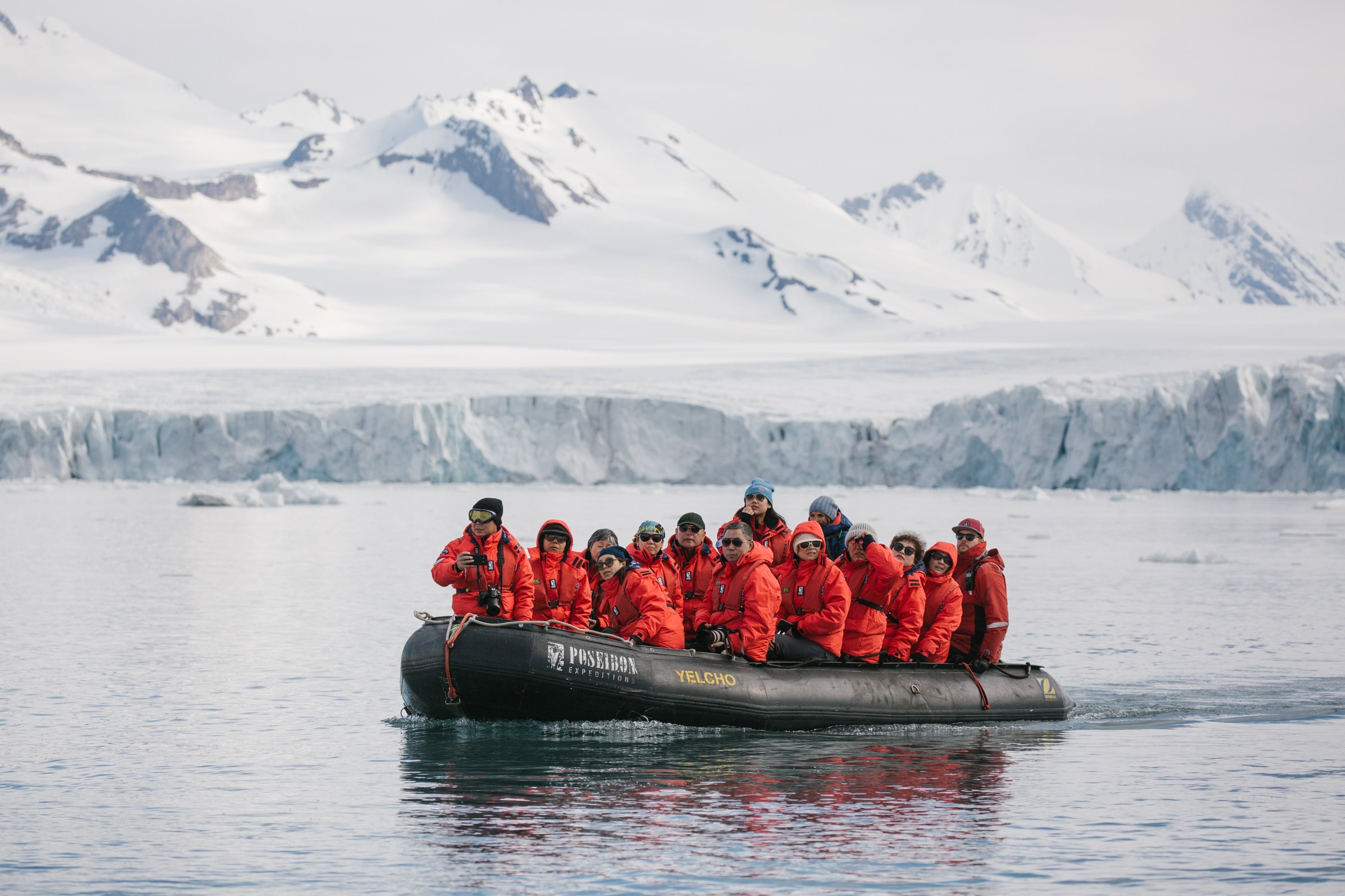 Polar cruise passengers in a Zodiac
