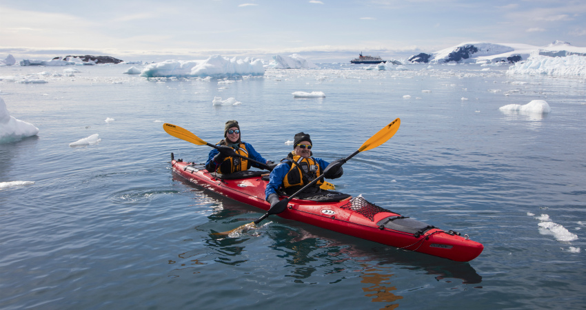 Kayaking companion in polar cruise