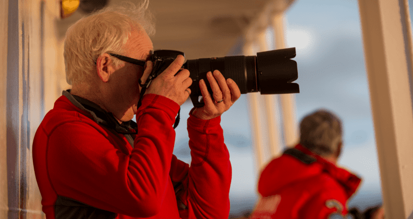 Photographers on the open deck