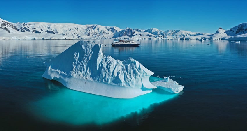 Small expedition ship in narrow harbour