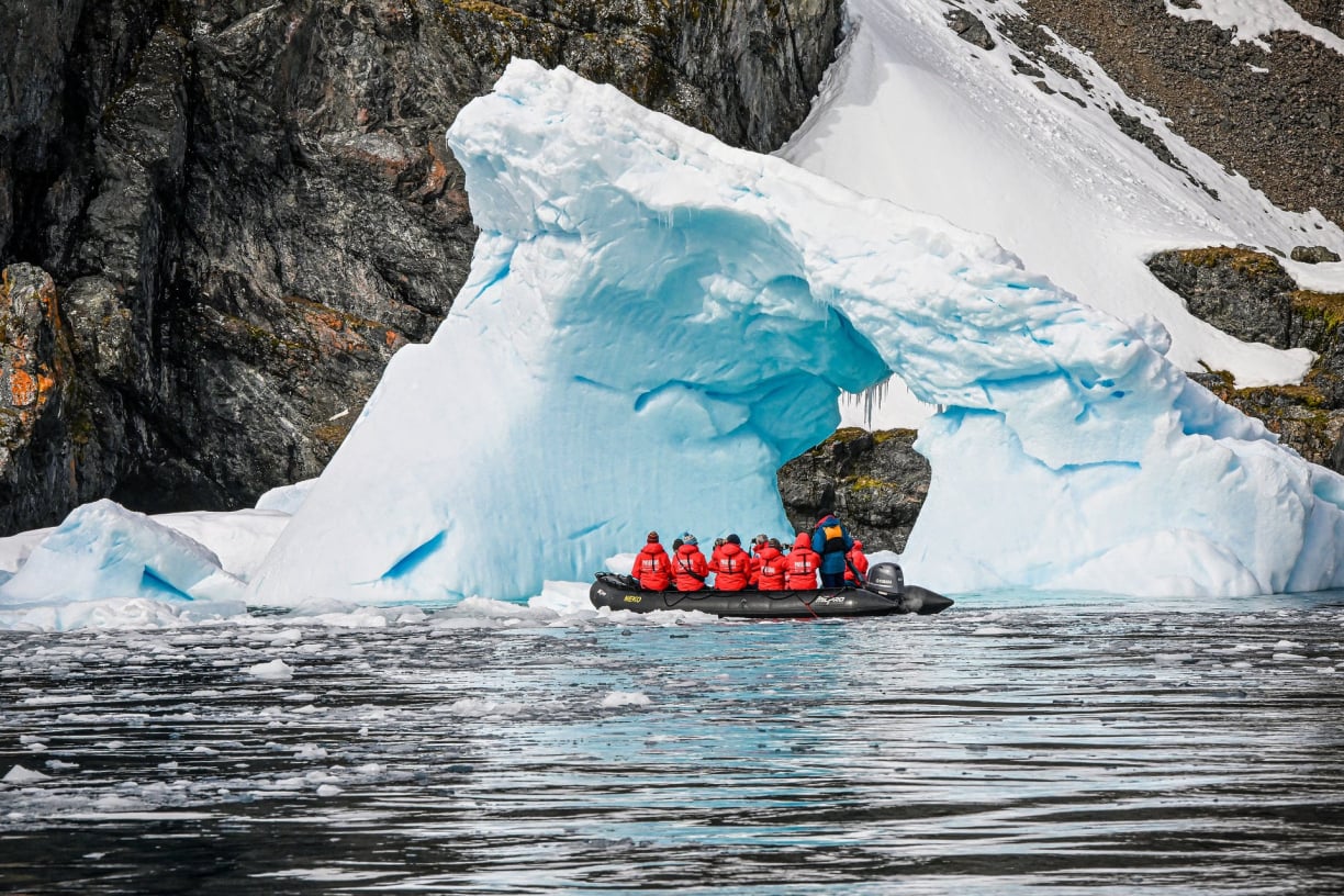 boat-under-iceberg.jpg