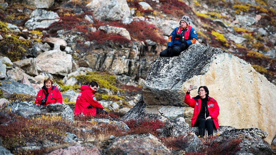 Passengers among the rocks and tundra of East Greenland